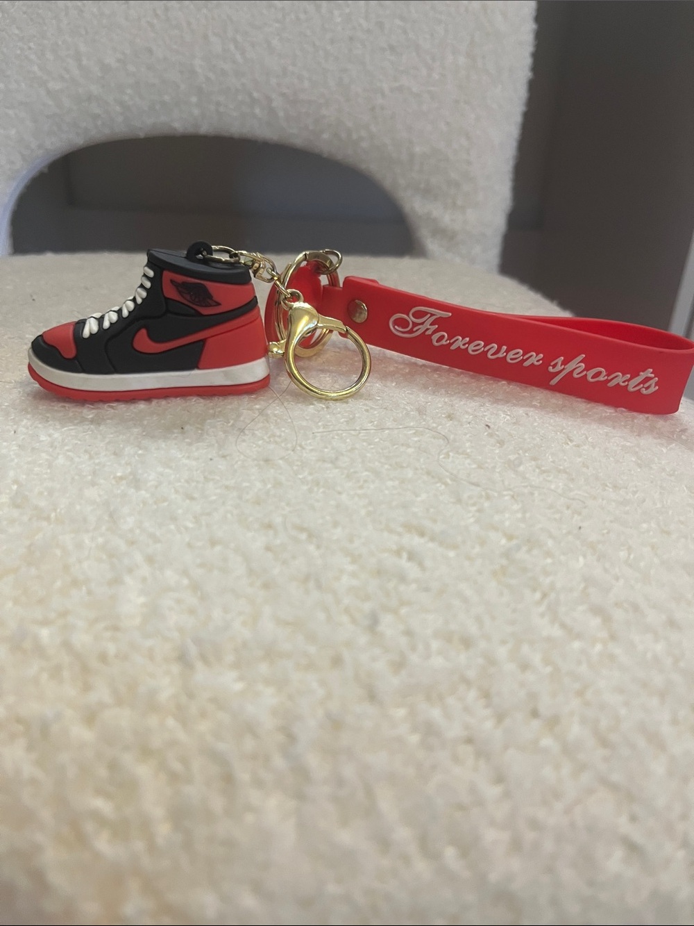 Red and Black Air Jordan Keychain with 'Forever Sports' Tag